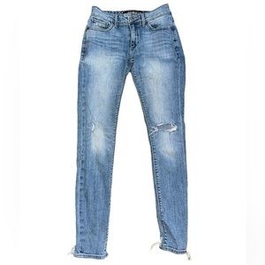 Distressed blue jeans
